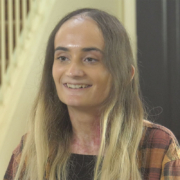 Noelle, a patient treated with ZEVASKYN, smiling